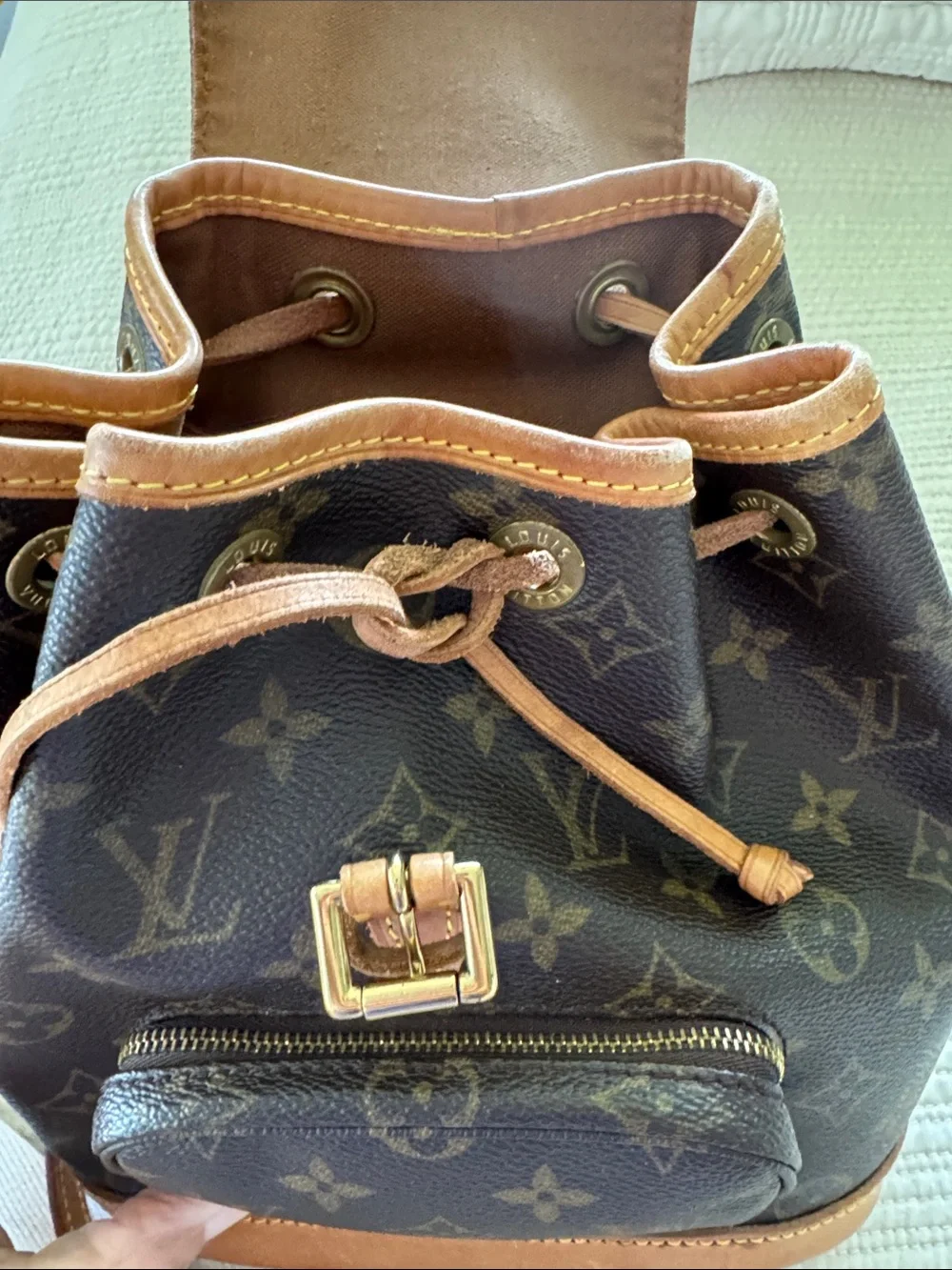 Louis Vuitton Monogram Drawstring Mini Backpack in Brown and Tan Leather Trim